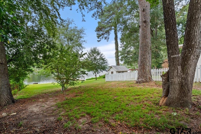 view of yard with a water view