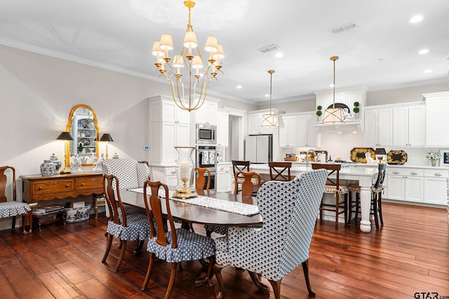 14698 Jade Forest Trl, Tyler, TX 75707 - dining space featuring dark wood finished floors, a chandelier, recessed lighting, and ornamental molding
