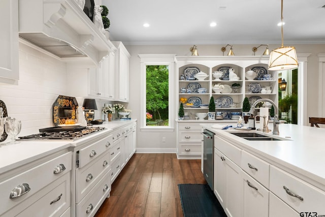 14698 Jade Forest Trl, Tyler, TX 75707 - kitchen with a sink, stainless steel appliances, light countertops, custom exhaust hood, and crown molding