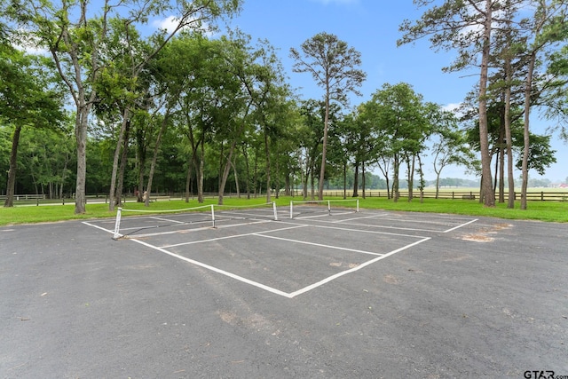 14698 Jade Forest Trl, Tyler, TX 75707 - view of parking featuring a tennis court