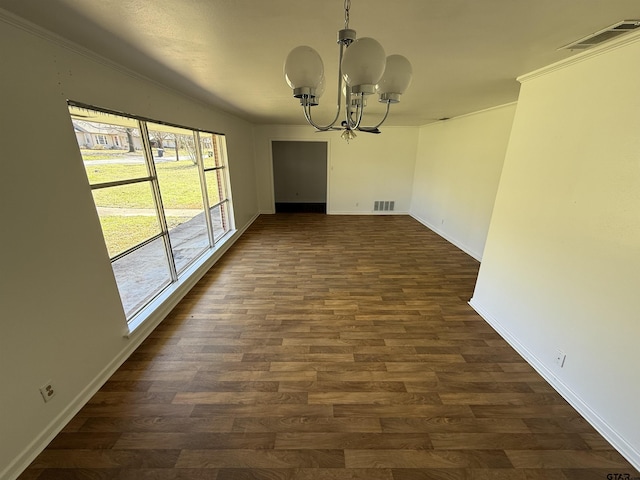 unfurnished dining area featuring baseboards, dark wood-style floors, visible vents, and a chandelier