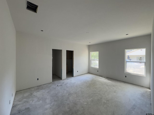 1212 N Albertson Ave, Tyler, TX 75702 - spare room with unfinished concrete floors