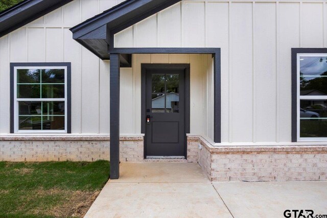 entrance to property with board and batten siding