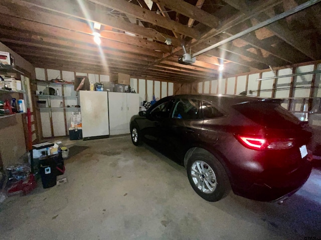 garage featuring a garage door opener