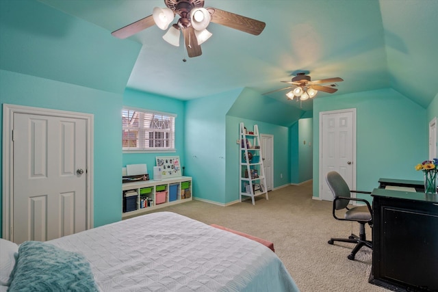 bedroom featuring ceiling fan, lofted ceiling, and light carpet