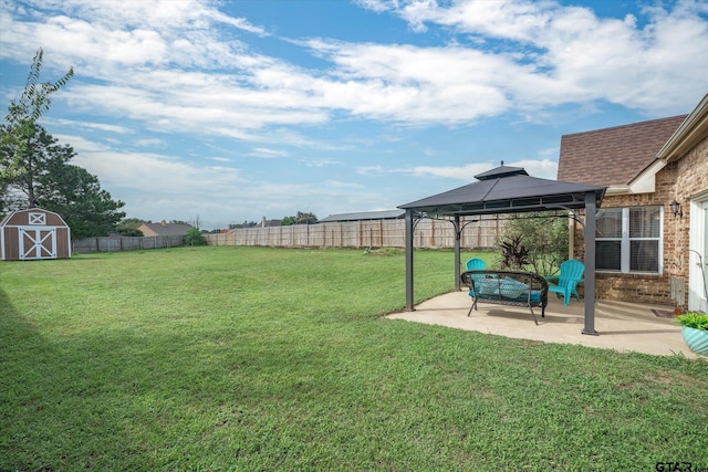 view of yard featuring a gazebo and a patio area