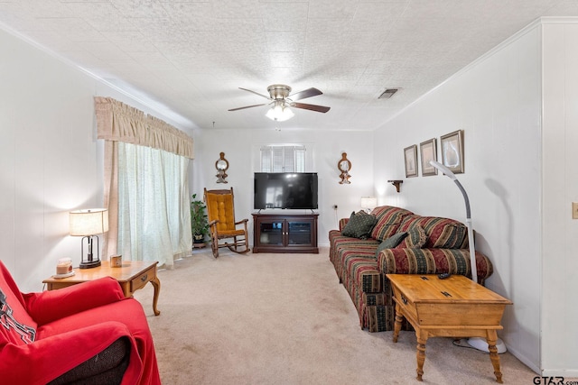 living room featuring light colored carpet and ceiling fan