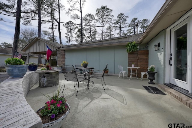 view of patio with outdoor dining area