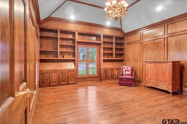 612 Rosemont Pl, Ii Place, Tyler, TX 75701 - unfurnished office featuring built in features, wood walls, a chandelier, lofted ceiling, and wood finished floors