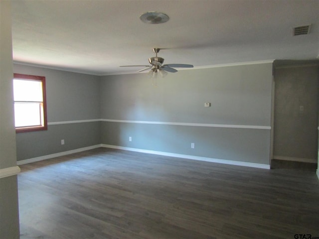 empty room with dark wood-type flooring and ceiling fan