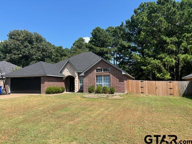 21327 Altuda Ln, Flint, TX 75762 - view of front of property with brick siding, a garage, and driveway