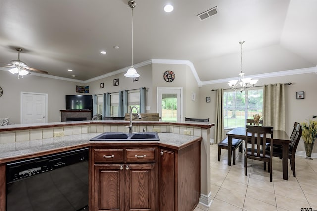 21327 Altuda Ln, Flint, TX 75762 - kitchen featuring dishwashing machine, a sink, light tile patterned flooring, a chandelier, and decorative light fixtures