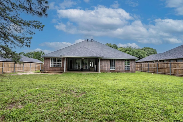 21327 Altuda Ln, Flint, TX 75762 - back of house featuring brick siding, a patio area, and roof with shingles