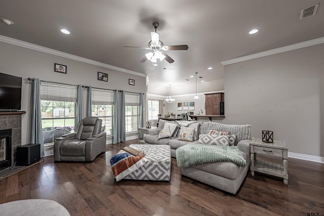 21327 Altuda Ln, Flint, TX 75762 - living area with ceiling fan, ornamental molding, dark wood finished floors, a fireplace, and recessed lighting