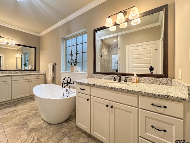 bathroom with ornamental molding, vanity, and independent shower and bath