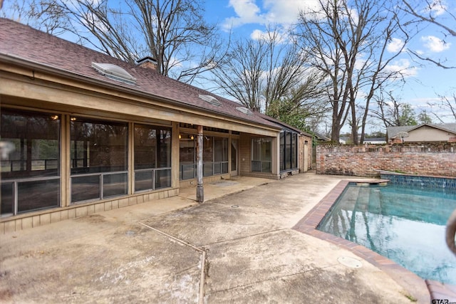 view of pool with a fenced in pool and a patio