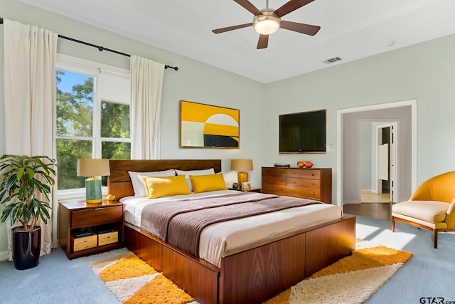 7031 Ridge Place Cir, Tyler, TX 75703 - bedroom featuring carpet and a ceiling fan