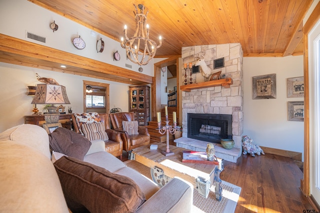 living area featuring lofted ceiling, visible vents, wood ceiling, a stone fireplace, and wood finished floors