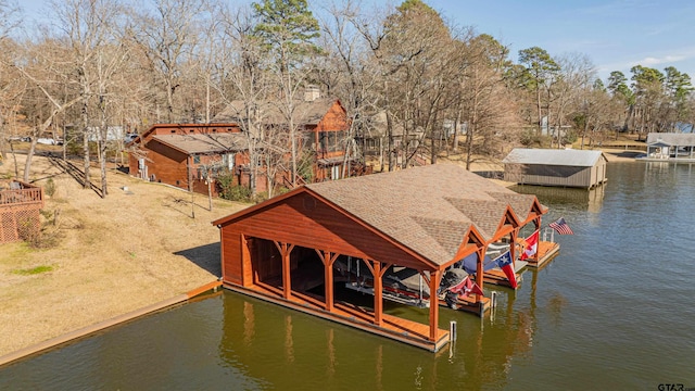 view of dock featuring a water view and boat lift