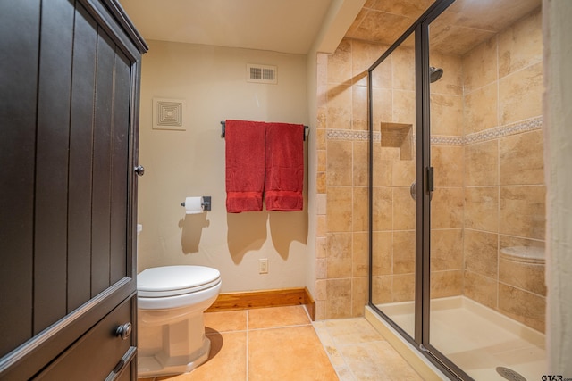 full bath featuring toilet, a stall shower, tile patterned flooring, and visible vents