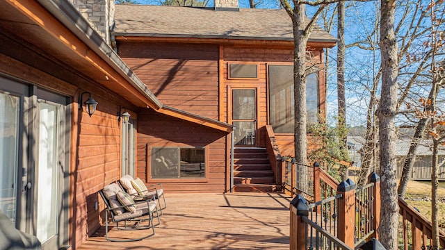 wooden deck featuring entry steps