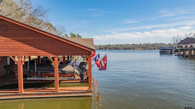 dock area featuring a water view and boat lift