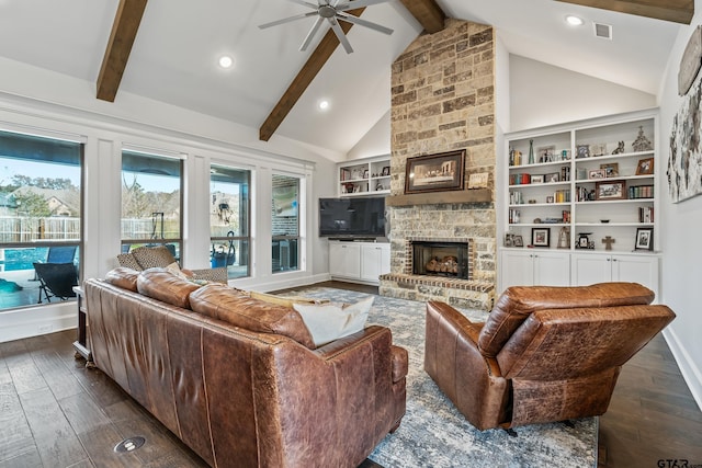 living room with beamed ceiling, a stone fireplace, high vaulted ceiling, and dark hardwood / wood-style flooring