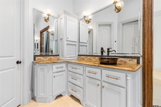 bathroom featuring tile patterned floors and vanity