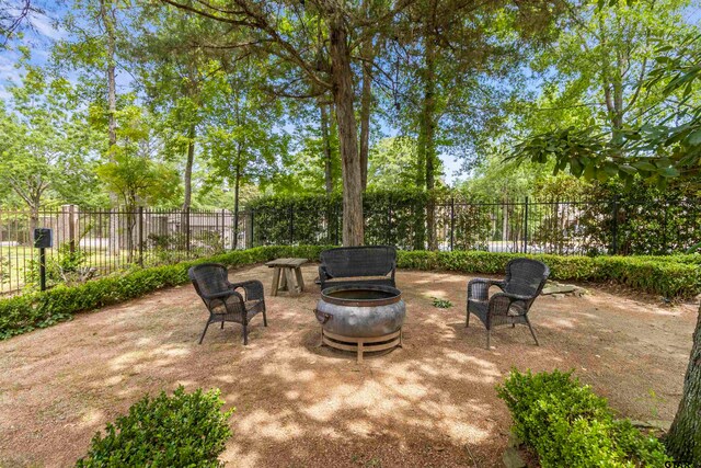 view of patio featuring an outdoor fire pit