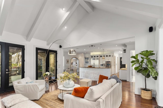 living room with beam ceiling, dark wood-type flooring, high vaulted ceiling, and french doors