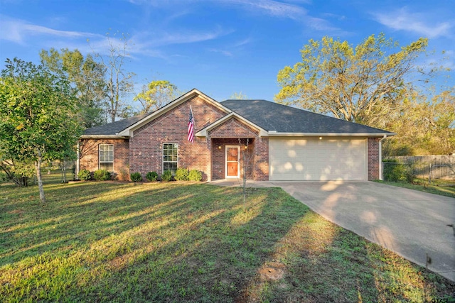 single story home featuring a front yard and a garage