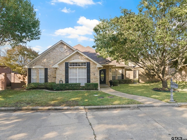 view of front facade with a front yard