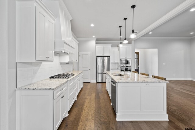 11918 Gillian Ct, Tyler, TX 75703 - kitchen with stainless steel appliances, a sink, crown molding, white cabinetry, and dark wood-type flooring