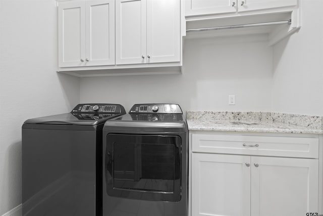 11918 Gillian Ct, Tyler, TX 75703 - laundry room featuring cabinet space and washer and clothes dryer