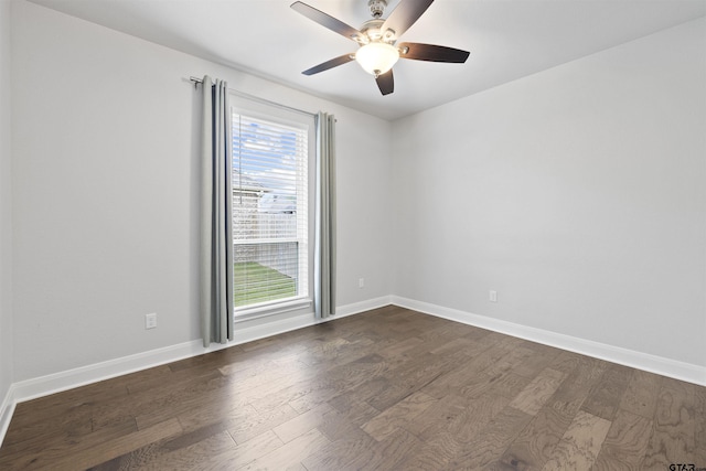 11918 Gillian Ct, Tyler, TX 75703 - unfurnished room featuring dark wood-type flooring, ceiling fan, and baseboards