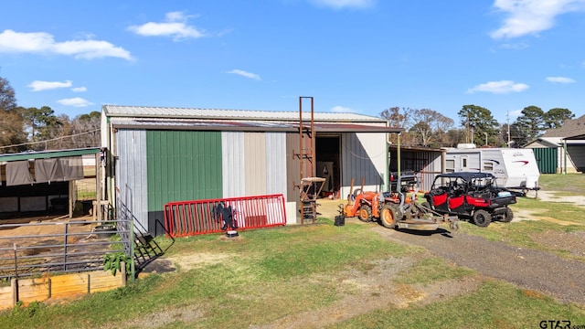 exterior space featuring an outbuilding