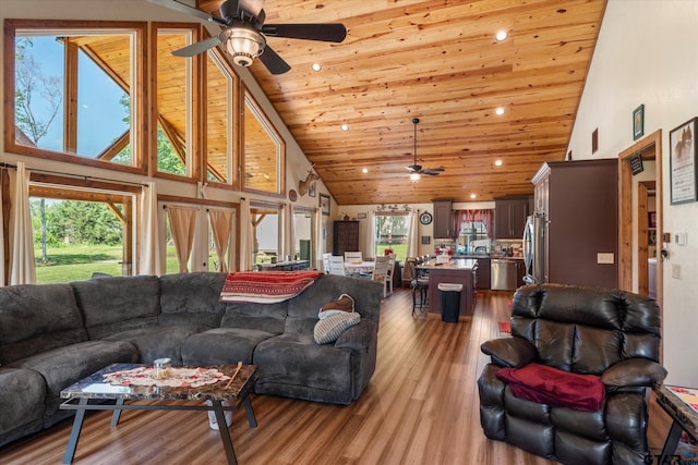 111 Little River Bnd, Quitman, TX 75783 - living room with light wood-type flooring, high vaulted ceiling, a ceiling fan, and wood ceiling