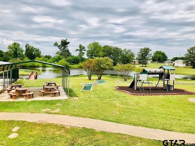 111 Little River Bnd, Quitman, TX 75783 - view of property's community featuring a yard, a water view, and a playground