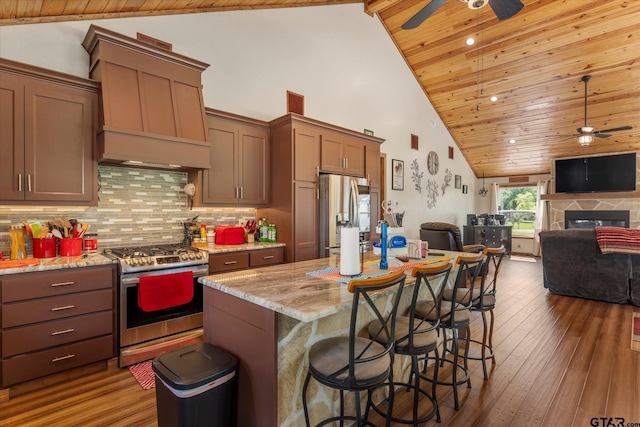 111 Little River Bnd, Quitman, TX 75783 - kitchen featuring wooden ceiling, high vaulted ceiling, a ceiling fan, appliances with stainless steel finishes, and open floor plan