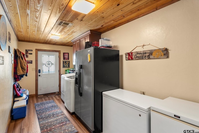 111 Little River Bnd, Quitman, TX 75783 - laundry area with wooden ceiling, laundry area, light wood-style flooring, washing machine and dryer, and visible vents