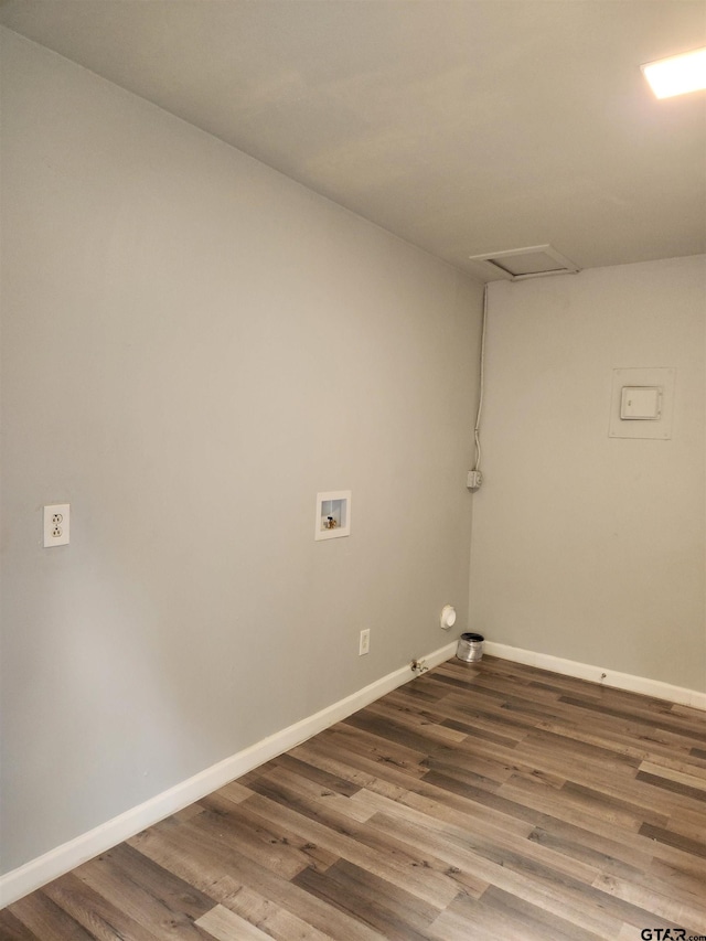 laundry room featuring washer hookup, hookup for a gas dryer, and hardwood / wood-style floors