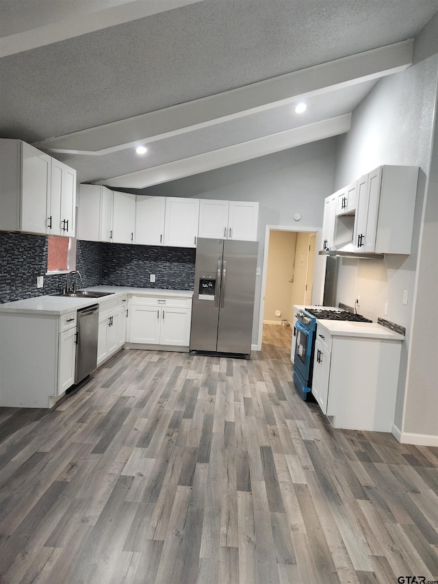 kitchen with white cabinets and stainless steel appliances