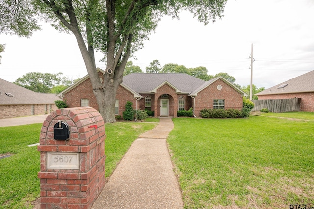 5607 Bostick Dr, Tyler, TX 75707 - view of front of house featuring brick siding