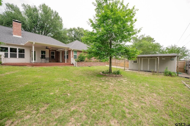 5607 Bostick Dr, Tyler, TX 75707 - view of yard featuring ceiling fan and a wooden deck