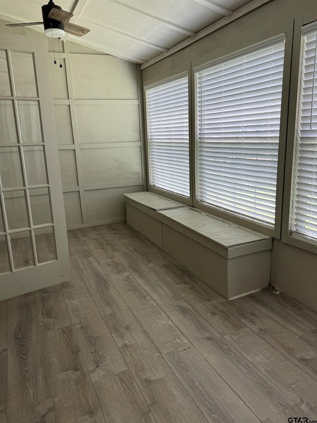 unfurnished room with ceiling fan and wood finished floors