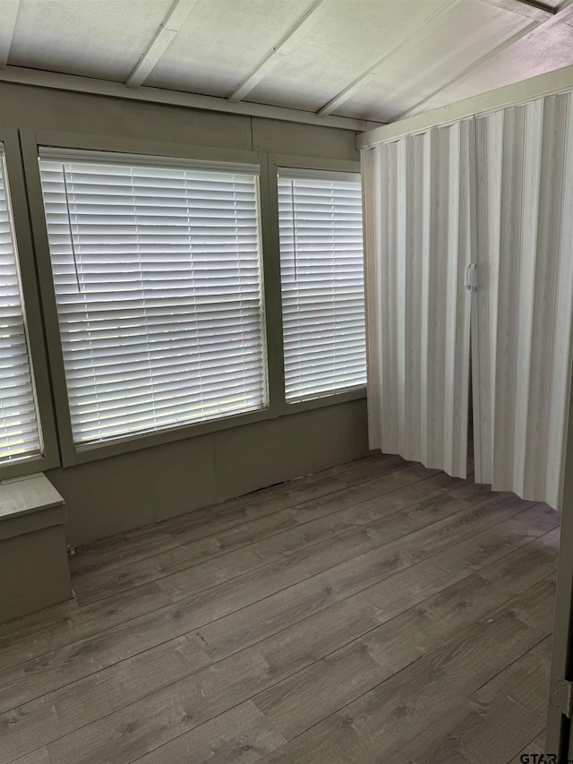 unfurnished room featuring wood finished floors