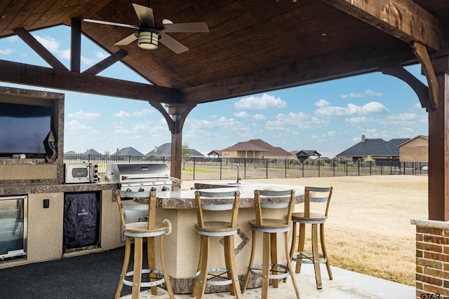 2921 W Alamosa Dr, Terrell, TX 75160 - view of patio featuring a grill, area for grilling, fence, and a residential view
