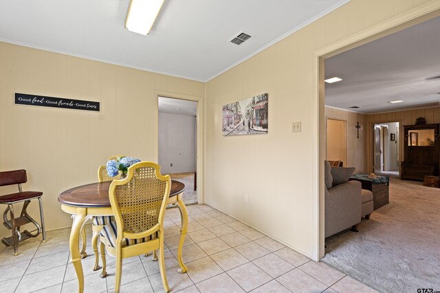 1901 Livingston St, Longview, TX 75601 - dining area with crown molding and light tile patterned flooring