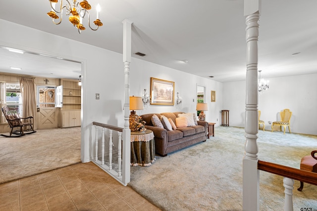 1901 Livingston St, Longview, TX 75601 - carpeted living room featuring a chandelier, tile patterned flooring, and baseboards