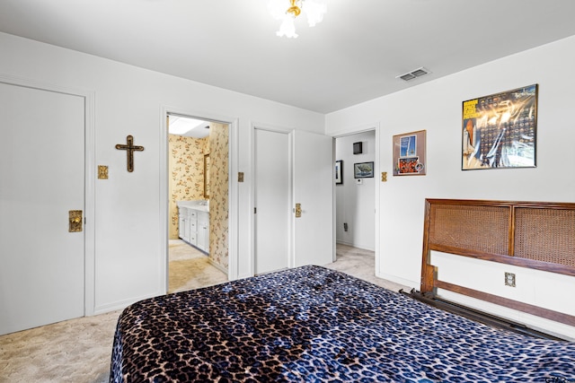 1901 Livingston St, Longview, TX 75601 - bedroom featuring light colored carpet and connected bathroom